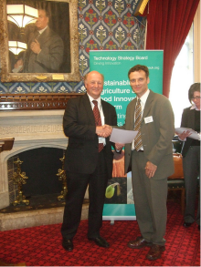 Adrian Marshall receiving a TSB grant from Jim Paice at the Houses of Parliament , July 2012